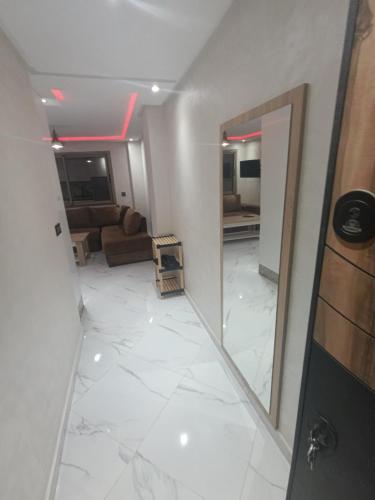 TV a/nebo společenská místnost v ubytování appartment igar azougagh elhoceima