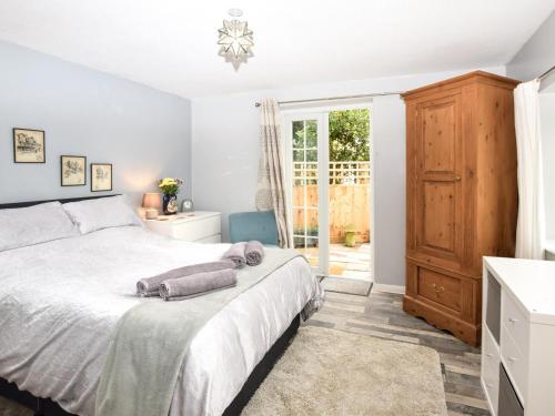 Katil atau katil-katil dalam bilik di 1 Bed in Freshwater 73929