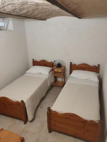 Postel nebo postele na pokoji v ubytování Vacanze Gargano dai nonni