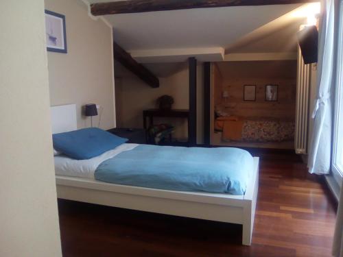 Postel nebo postele na pokoji v ubytování B&B L'Albero Maestro
