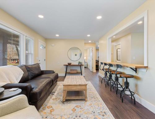 a living room with a couch and a table at Diana's Place - 6 BDR Ranch Long or Short Stays in Murfreesboro