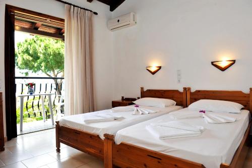 Ένα ή περισσότερα κρεβάτια σε δωμάτιο στο Villa Anna Maria