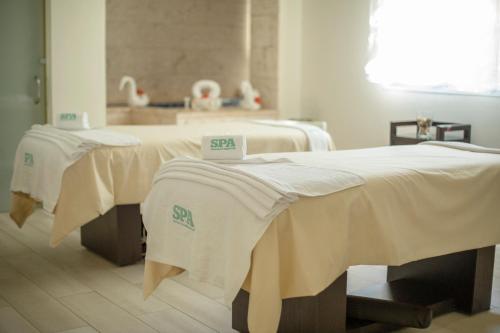 Letto o letti in una camera di Iberostar Selection Coral Bavaro - All Inclusive