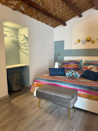 Ένα ή περισσότερα κρεβάτια σε δωμάτιο στο Borgo Bortolone