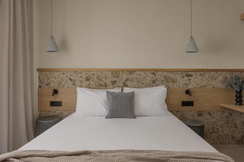 Cama o camas de una habitación en Lumora Suites