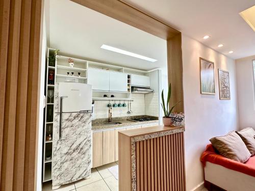 Cuisine ou kitchenette dans l'établissement Localização privilegiada Apenas 8Min da Orla de Atalaia 5Min do Shopping 10Min Centro , 2 Quartos