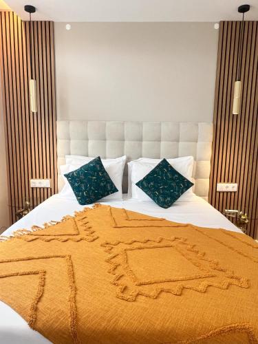Кровать или кровати в номере Raiano Guest House