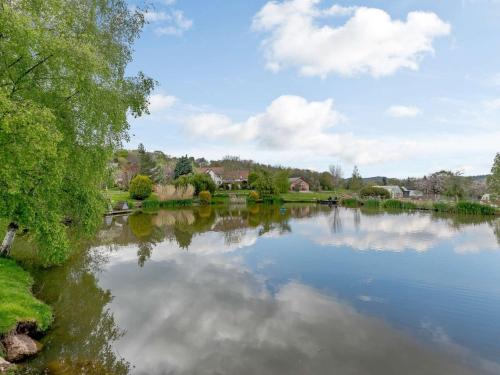 a view of a river with clouds in the water at 3 bed in Worcester CC037 in Clifton upon Teme