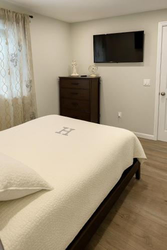 Katil atau katil-katil dalam bilik di Autumn Escape by the Cape 4 drm home