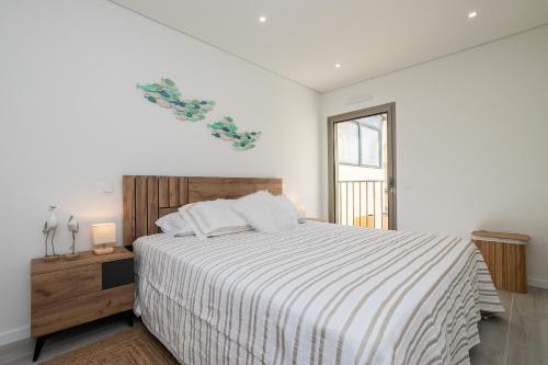 En eller flere senge i et værelse på Casa Gaspar - Tavira Luxury Apartment