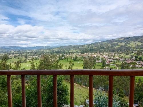 a view from the balcony of a house at Hospedaje campestre Esmeraldas in Duitama