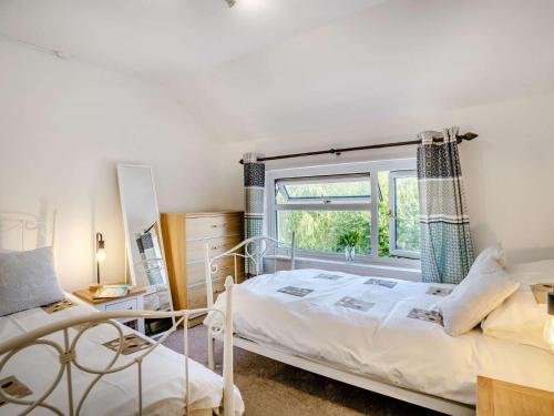 Ένα ή περισσότερα κρεβάτια σε δωμάτιο στο 2 Bed in Gower 62019