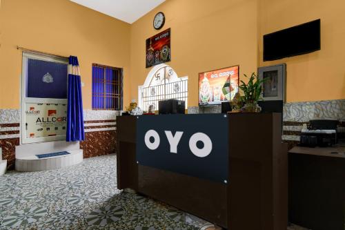 an office with an ovo sign in a room at OYO Flagship Hotel O Mo Kudia in Puri