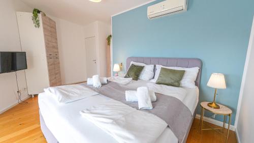 Ένα ή περισσότερα κρεβάτια σε δωμάτιο στο Christiano Apartments Hauptbahnhof | contactless check-in