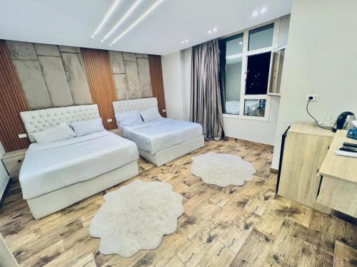 Ένα ή περισσότερα κρεβάτια σε δωμάτιο στο Atta pyramid view inn