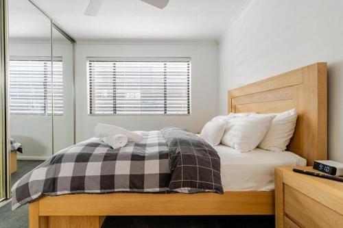 Ένα ή περισσότερα κρεβάτια σε δωμάτιο στο City View Serviced Apartments
