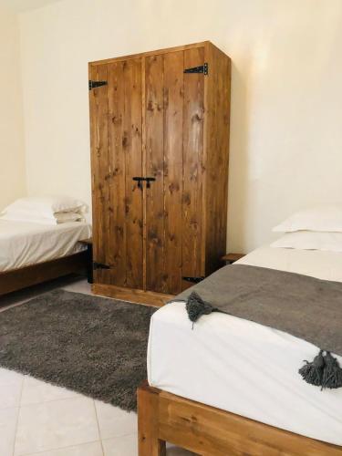 Postel nebo postele na pokoji v ubytování Be My Guest