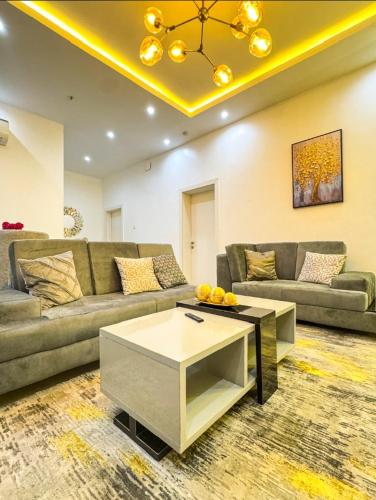Zona de estar de Exquisite Apartments