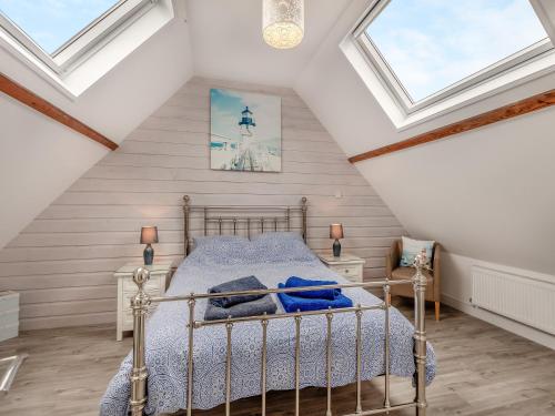 Katil atau katil-katil dalam bilik di High Tide House