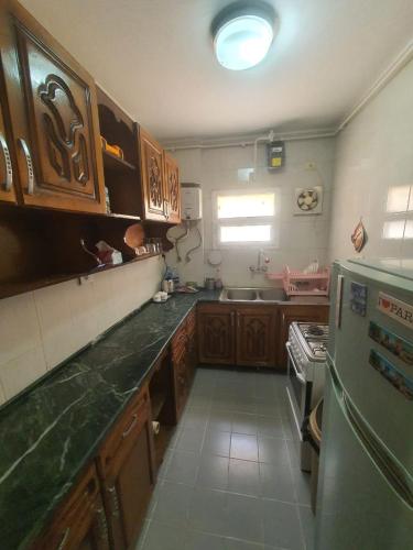 Kitchen o kitchenette sa TREE Serviced Apartment -3BHK Self check-in