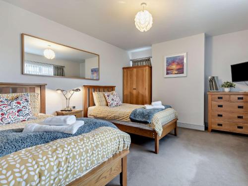 Voodi või voodid majutusasutuse 3 Bed in Winterton-on-Sea 46478 toas