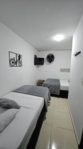 Hotel casa yotamaにあるベッド