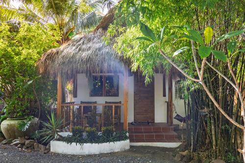 a small house in the middle of a forest at Kampot Cabana in Kampot