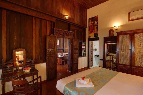Postel nebo postele na pokoji v ubytování Somatheeram Ayurveda village