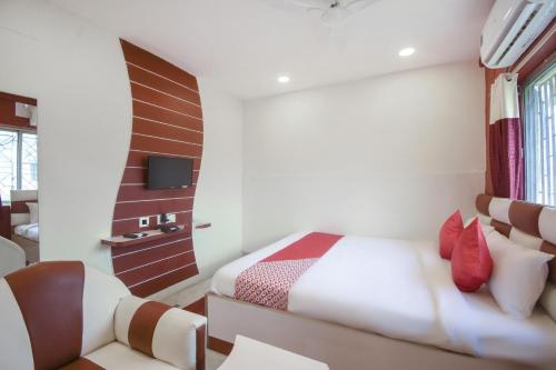 Super Hotel O Red Stone Near Netaji Subhash Chandra Bose International Airportにあるベッド