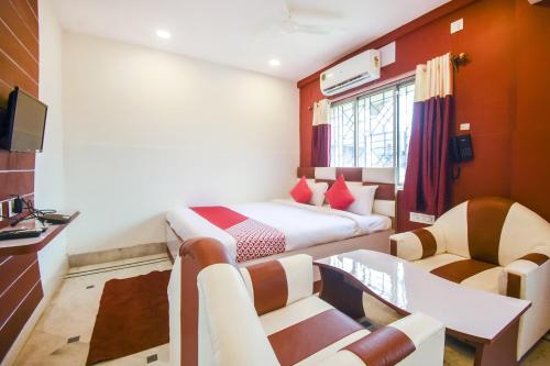Super Hotel O Red Stone Near Netaji Subhash Chandra Bose International Airportにあるテレビまたはエンターテインメントセンター