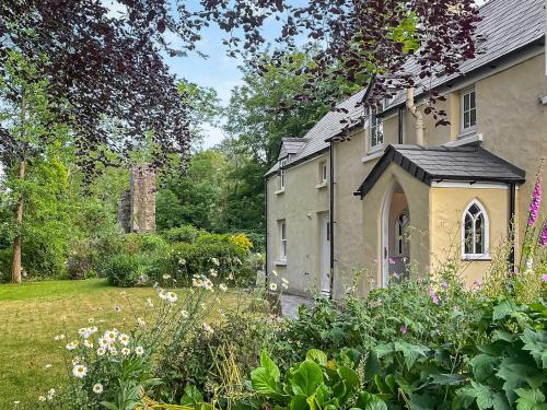 a house with a garden in front of it at Priory Stile in Haverfordwest