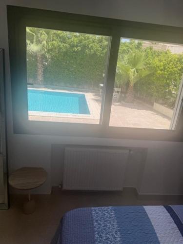 Kolam renang di atau dekat dengan Luxurious Apartment in Gammarth Touristique
