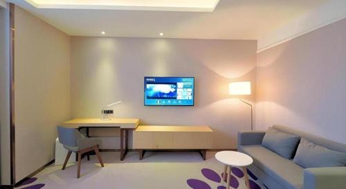 Televisyen dan/atau pusat hiburan di PAI Hotel·Huazhou Bus Terminal