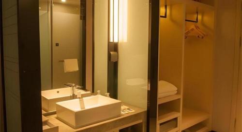 Ένα μπάνιο στο Echarm Hotel Binzhou Boxing Yinzuo
