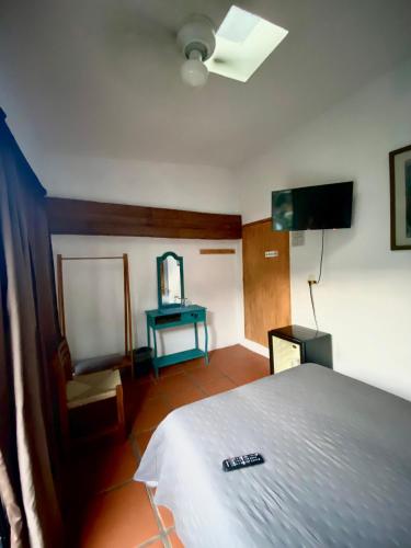 Postel nebo postele na pokoji v ubytování Posada Casa Topiltzin