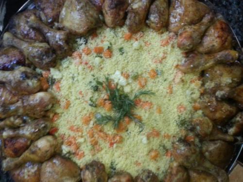 a close up of a pizza with carrots and other food at Prinshof Manor Guesthouse in Pretoria