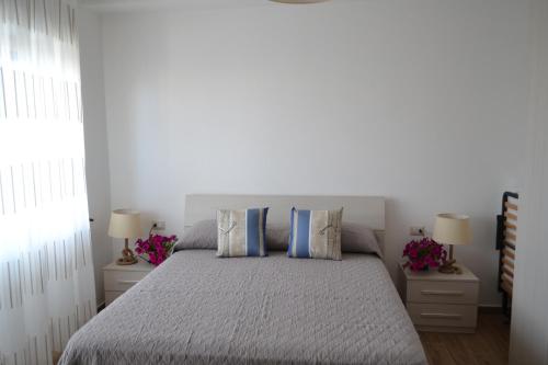 Ein Bett oder Betten in einem Zimmer der Unterkunft B&B LINEABLU