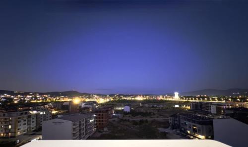 a view of a city at night at Galina Apartment in Kŭrdzhali