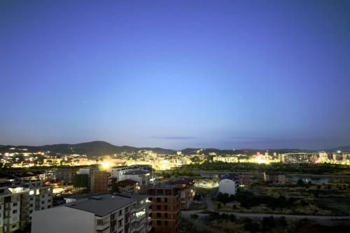 a view of a city at night at Galina Apartment in Kŭrdzhali