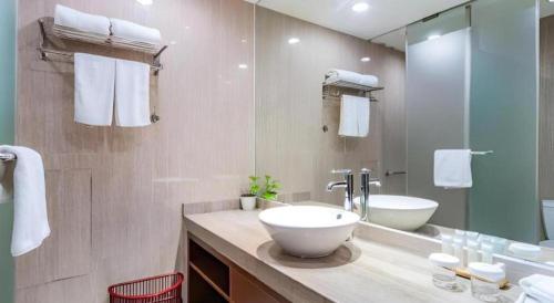 Koupelna v ubytování Jinjiang Metropolo Shaoxing Keqiao Wanda Plaza