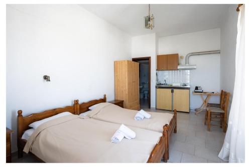 Η κουζίνα ή μικρή κουζίνα στο kosmas rooms