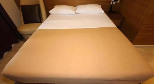 Ένα ή περισσότερα κρεβάτια σε δωμάτιο στο Honey Lodge