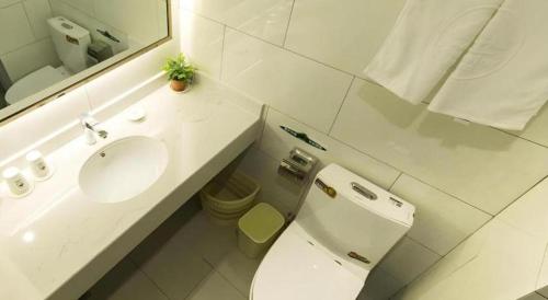 Ένα μπάνιο στο GreenTree Inn Maanshan Hanshan District Jiuwu Square Hotel
