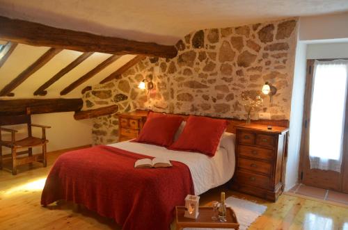 Ένα ή περισσότερα κρεβάτια σε δωμάτιο στο Hostal Refugio De Gredos