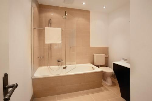 Um banheiro em Hotel Villa Florentina