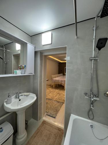 Koupelna v ubytování Guesthouse Gulmira