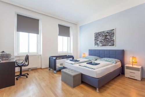 Una cama o camas en una habitación de Lodge in Style Vienna - Austria Campus