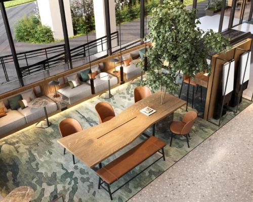 a dining room with a wooden table and chairs at Hyatt Place Ha Long Bay, Bai Chay in Ha Long