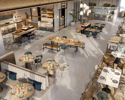 an overhead view of a restaurant with tables and chairs at Hyatt Place Ha Long Bay, Bai Chay in Ha Long