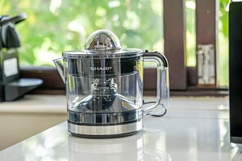 a blender sitting on top of a counter at 9 Bedroom Villa Mui Ne With Private Pool in Mui Ne